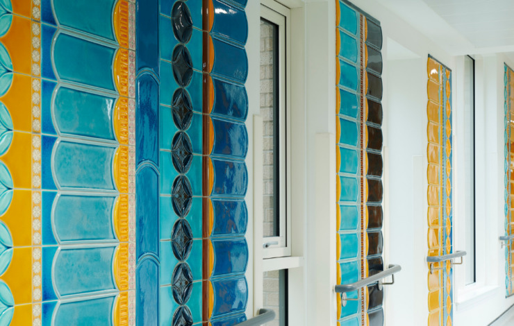 ArtsCommissionTiledCorridorREHFeatured