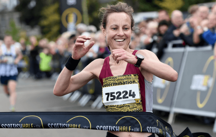 Runner crossing finish line