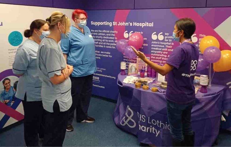 NHS Lothian Charity team talking to NHS Lothian Staff at St John's Hospital