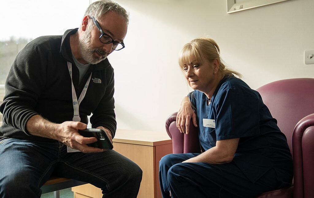 NHS Lothian staff being shown her Havens portrait
