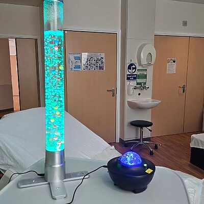 lava lamp and disco light on hospital bed