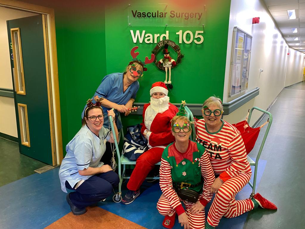 NHS Staff dressed up celebrating National Elf Service Day