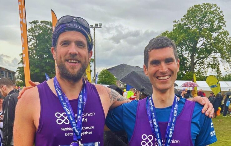 Neil Chalmers and Grant Aitken smiling at the camera after the Edinburgh Marathon Festival